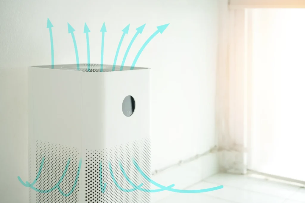 Air purifier improving indoor air quality: An air purifier placed in a room, equipped with air quality sensors and automatic fan speed adjustment