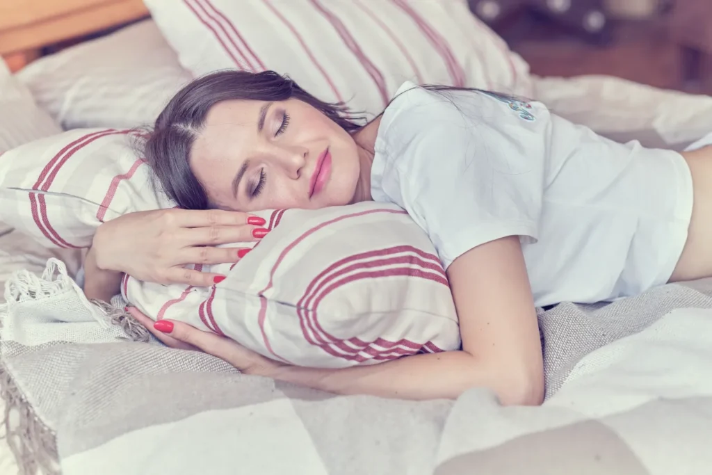 Person sleeping peacefully showcasing benefits of sleep	