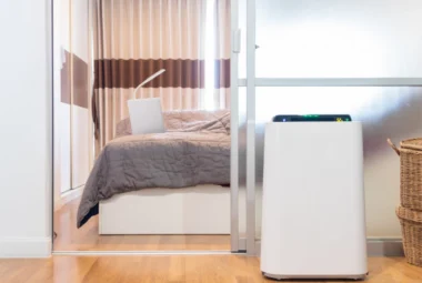 Air purifier with HEPA filter in a bedroom